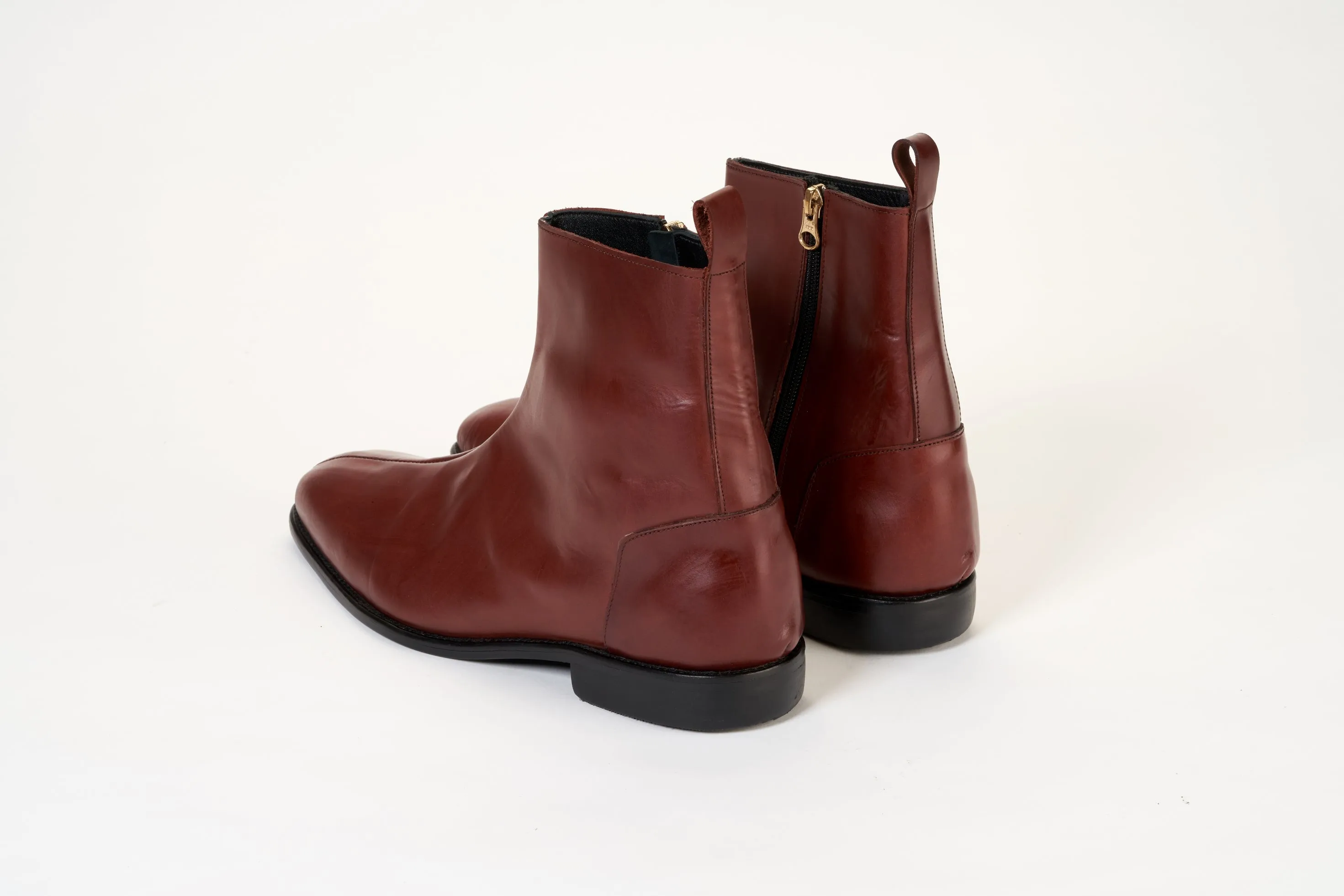 Ajadi Boots in Brown Leather with Side Zipper and Black Leather Soles