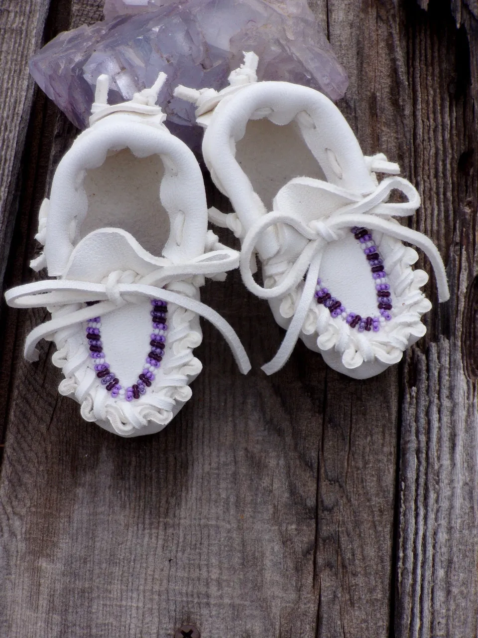 Beaded baby moccasins, white buckskin moccasins